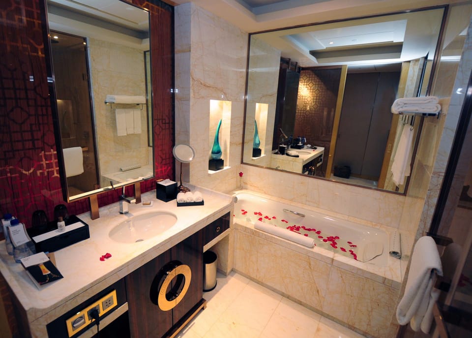 Rainfall showerhead, hair dryer, slippers, towels