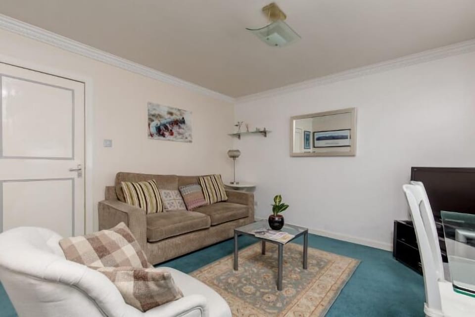Apartment, 2 Bedrooms | Living area | TV
