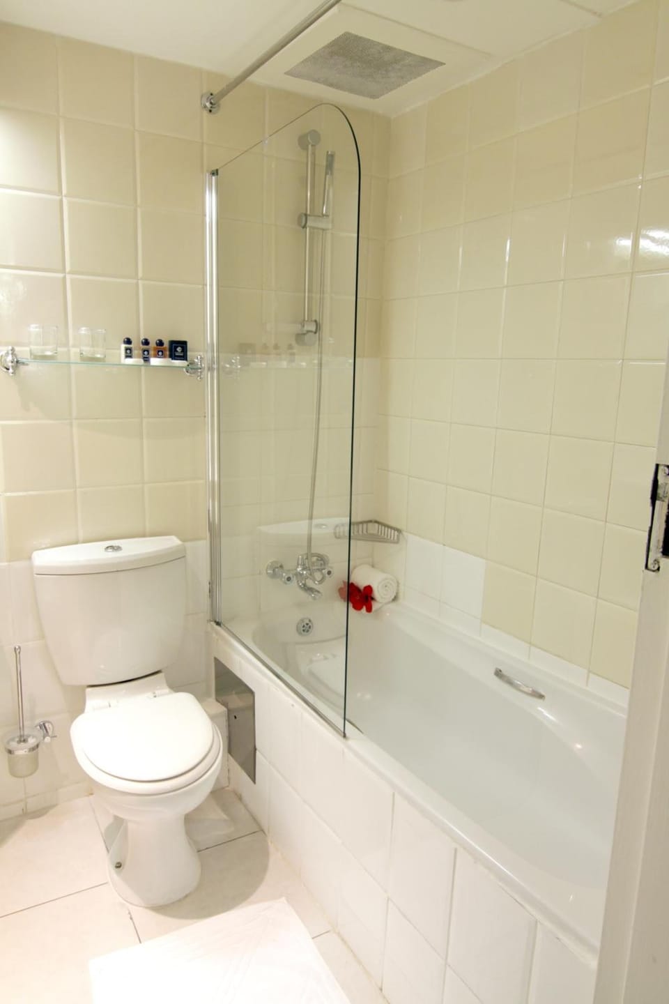 Bathtub, eco-friendly toiletries, towels