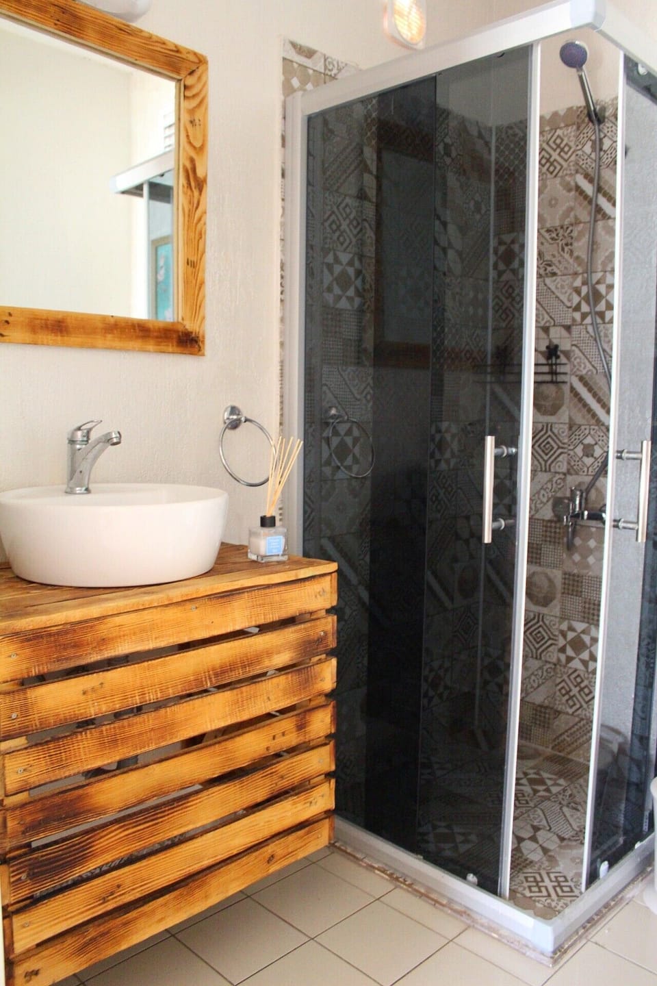 Shower, hydromassage showerhead, hair dryer, towels