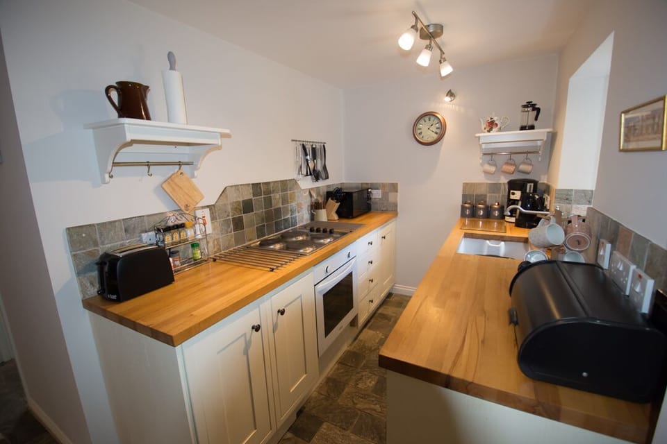 Kitchen - well equipped including dishwasher, microwave and coffee maker