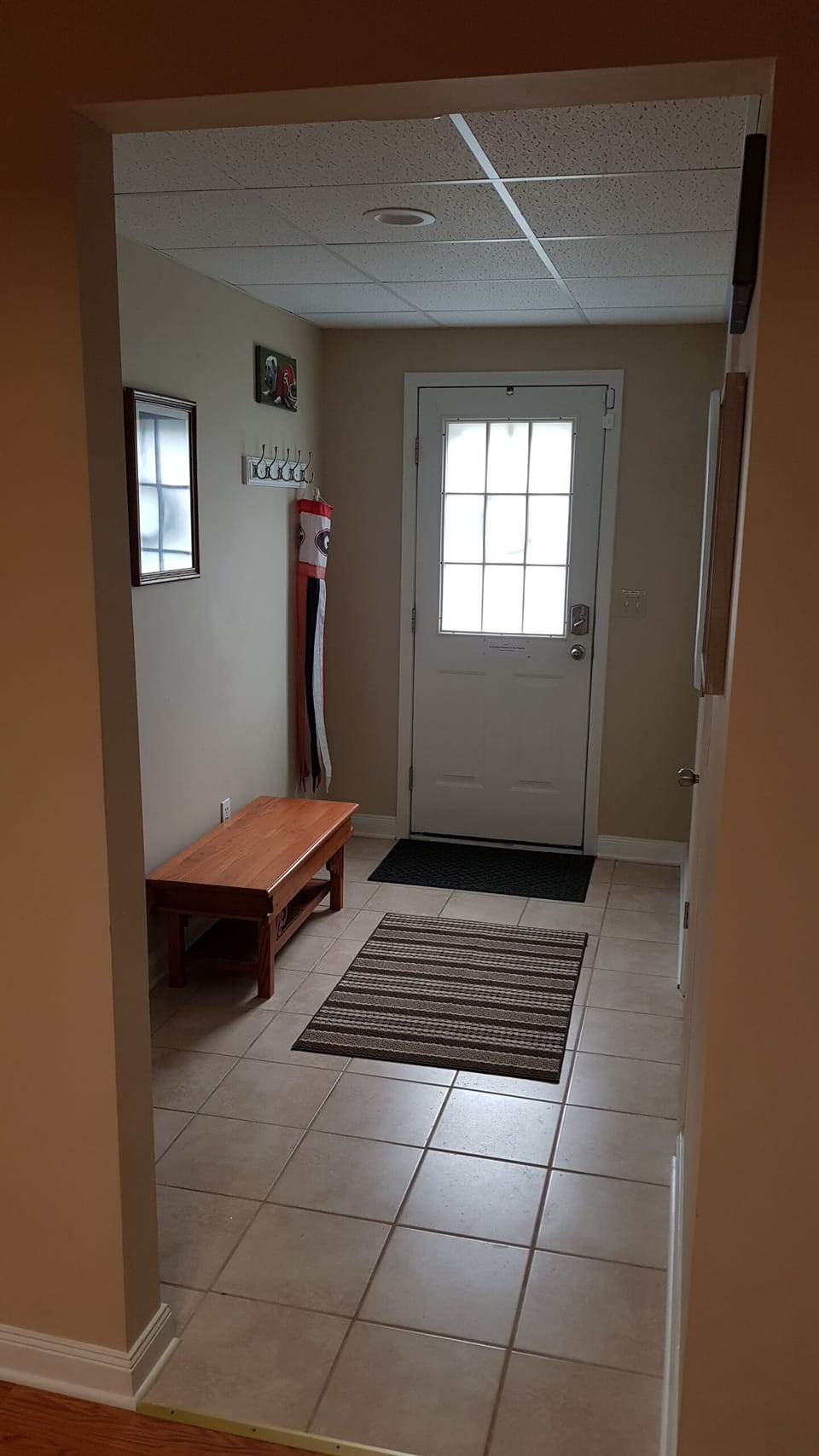 Inside the apartment showing the door you come in from.