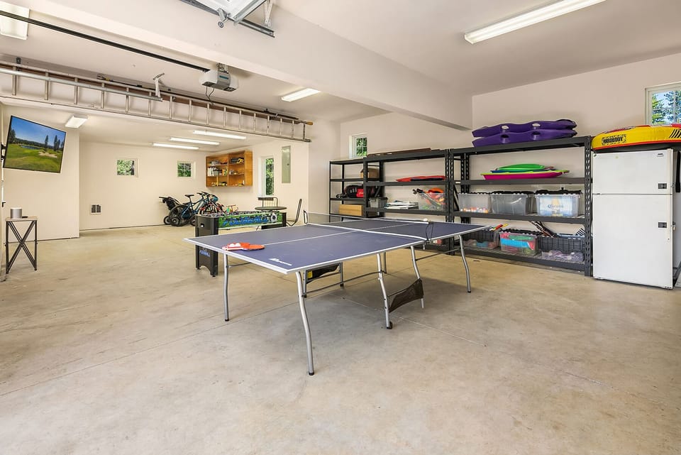 Rocking Chair Retreat - Ping Pong, Shuffleboard, and TV in the garage game room.