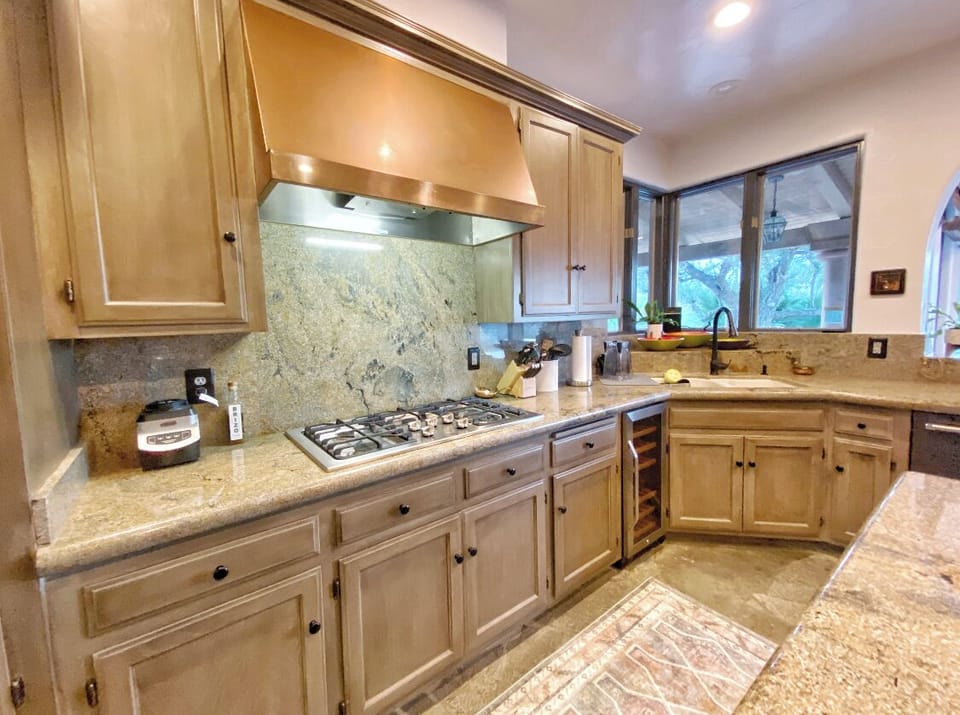 Gas burner, wine fridge, double ovens and all the kitchen essentials.