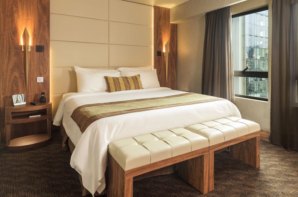 Premium bedding, down comforters, minibar, in-room safe