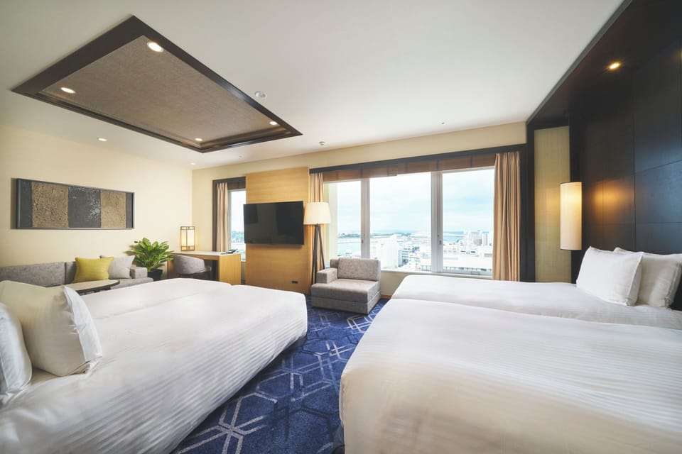 Premium bedding, down comforters, in-room safe, desk