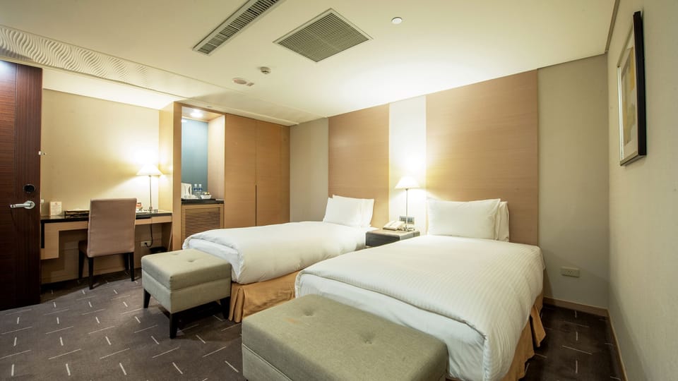 Standard Twin Room, No Windows | Down comforters, desk, laptop workspace, blackout drapes