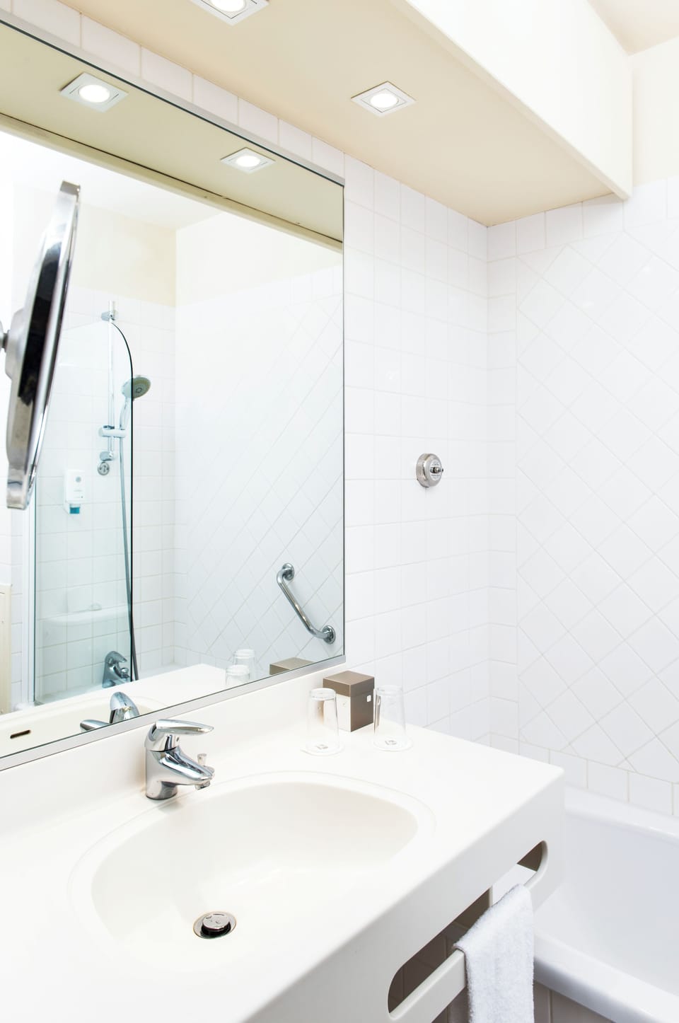Bathtub, hair dryer, towels