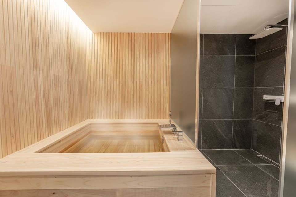 Deluxe Hinoki bath Double - Free Breakfast for 2 (Rice Noodle) Room is larger than most in Busan | Bathroom | Designer toiletries, hair dryer, bathrobes, slippers