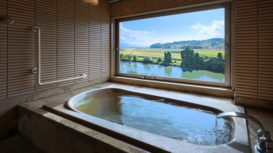 Deluxe twin room with bath, Mogamigawa River view, Non Smoking | Bathroom | Separate tub and shower, hair dryer, slippers, electronic bidet
