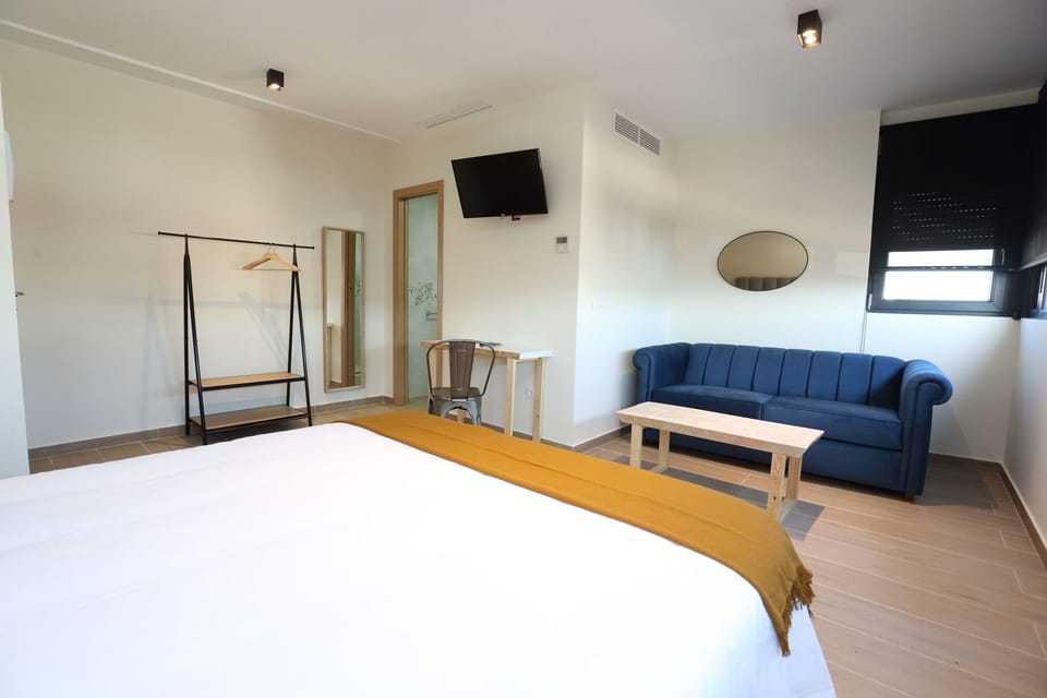 Junior Studio Suite | Premium bedding, down comforters, memory foam beds, desk