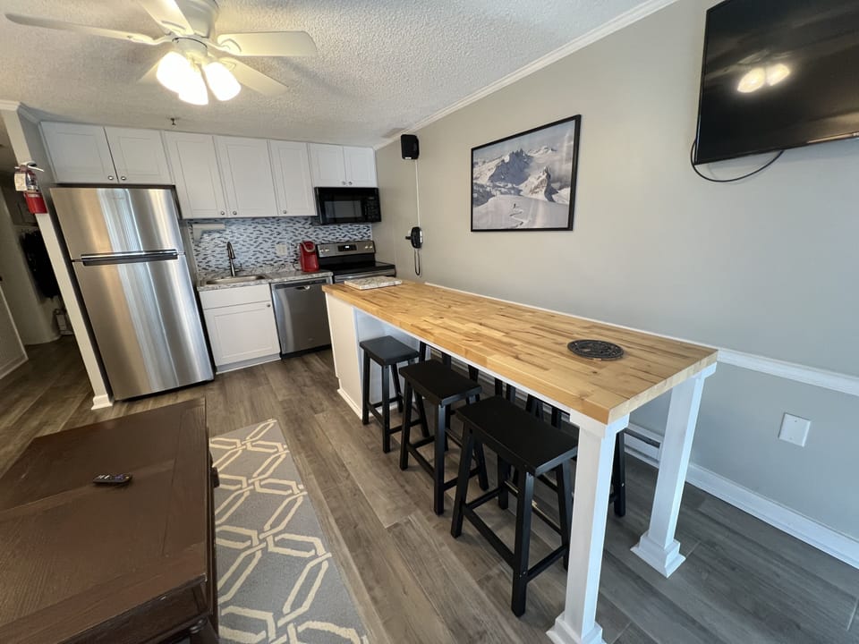 8 ft Butcher Block Island seats 6 for dining in