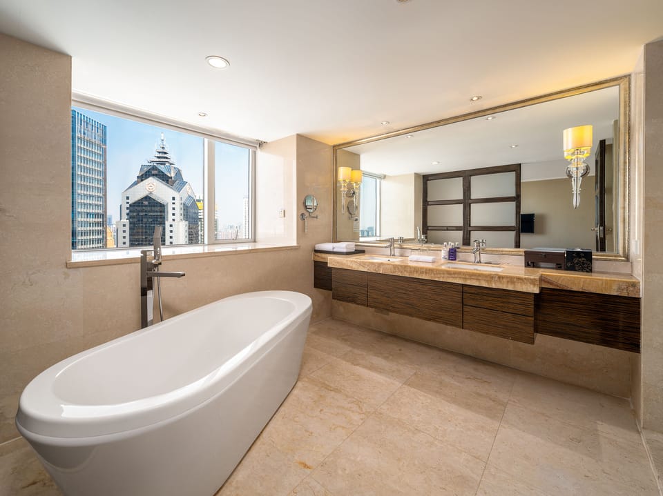 Dorsett Suite | Bathroom | Combined shower/tub, rainfall showerhead, free toiletries, hair dryer