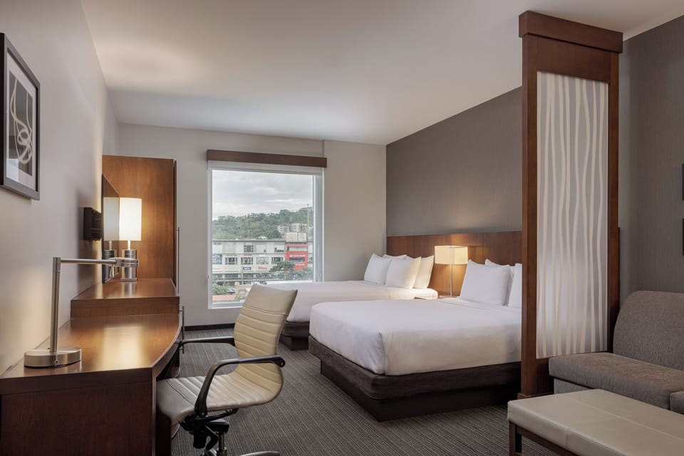 Standard Room, 2 Queen Beds | Premium bedding, in-room safe, desk, soundproofing