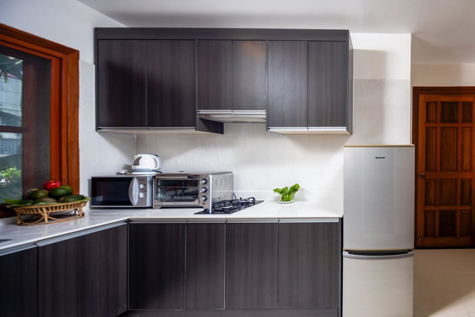 Family Room | Private kitchen | Fridge, dining table