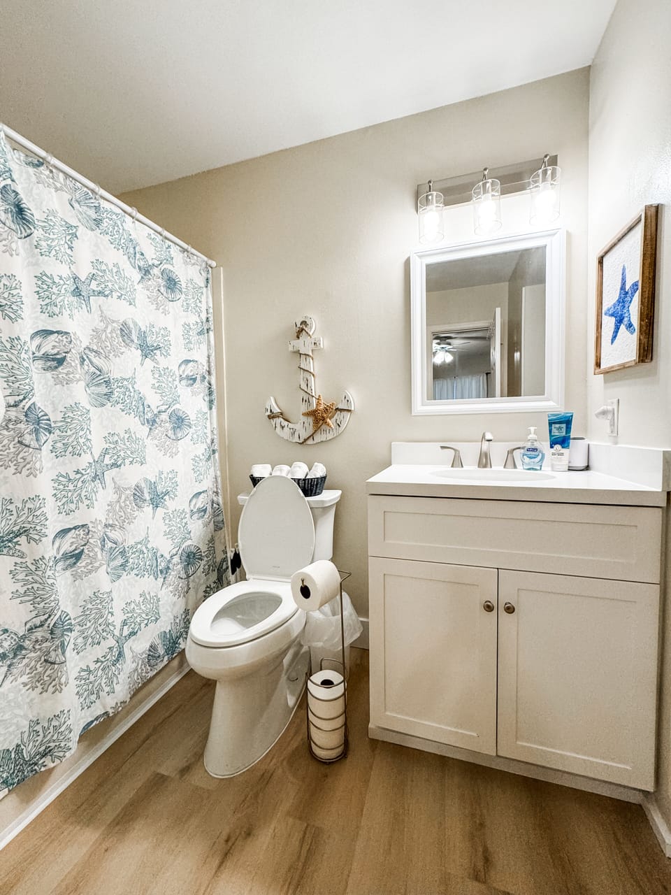Here is the guest bathroom which connects to the hallway and the guest bedroom.