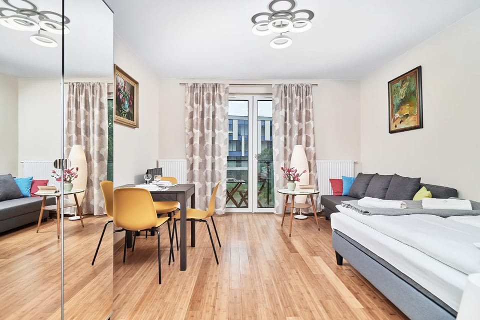 The living area's modern and stylish decor creates a welcoming atmosphere. 