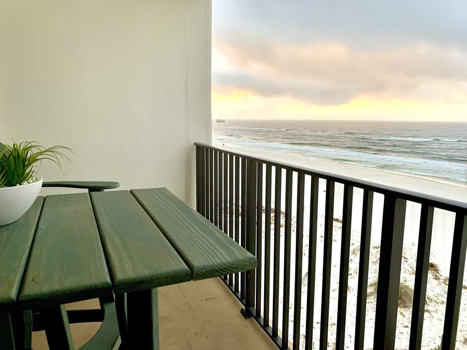 The sunrise peaks right over the horizon-great place for your morning coffee.