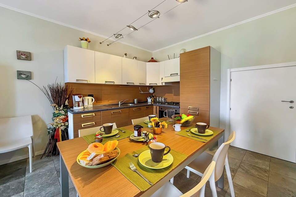 Family Apartment, 2 Bedrooms, 2 Bathrooms, Mountainside (Mansarda di Pianello) | Private kitchen | Oven, stovetop, dishwasher, coffee/tea maker