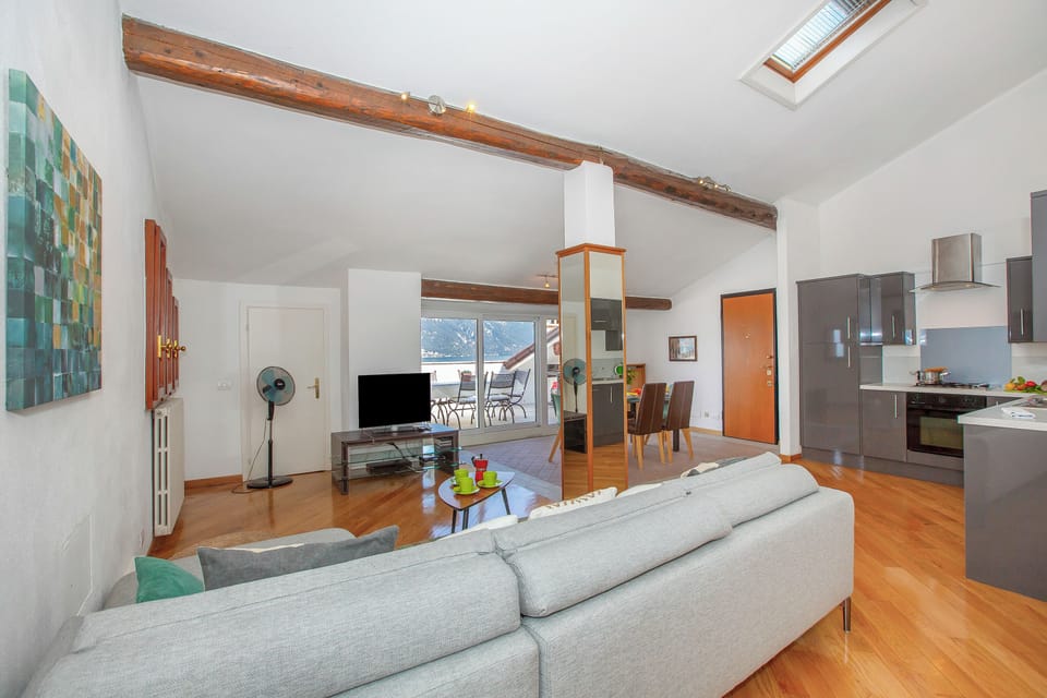 Family Apartment, Multiple Bedrooms, 2 Bathrooms (Bella Menaggio Panoramica) | Living room | 24-inch flat-screen TV with satellite channels, TV, DVD player