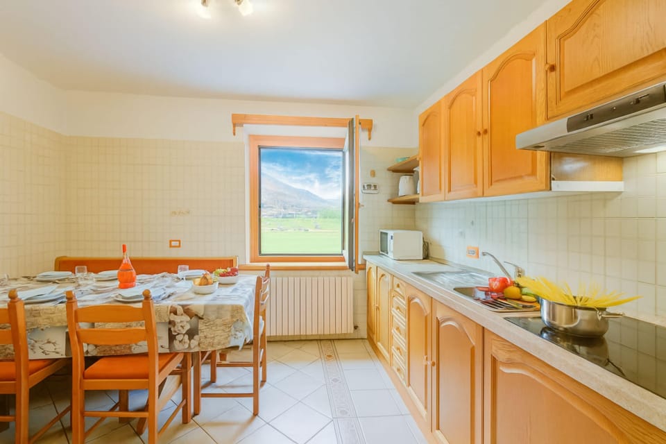 Family Apartment, 3 Bedrooms, 2 Bathrooms (Stella Alpina) | Private kitchen | Fridge, microwave, stovetop, dishwasher