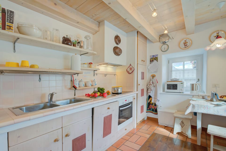 Family Apartment, 4 Bedrooms, Microwave (Antico Chalet) | Private kitchen | Microwave, oven, stovetop, dishwasher