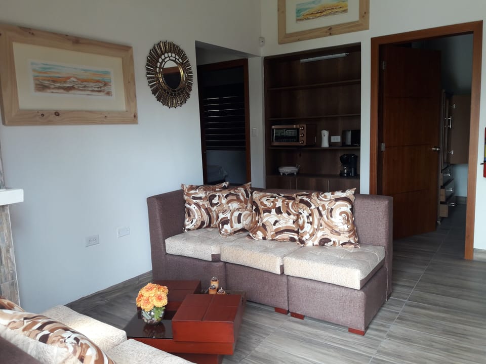 Deluxe Double Room, Shower Grab Bars, Garden View | Living area | Smart TV, fireplace, heated floors