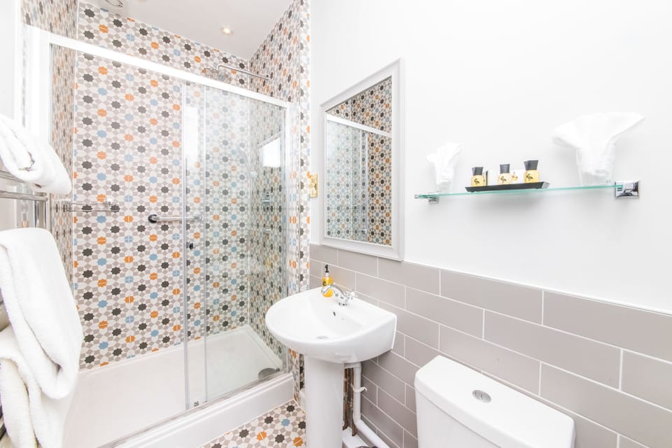 Premium Suite, Terrace (Feature King or Twin Room) | Bathroom | Shower, eco-friendly toiletries, hair dryer, bathrobes