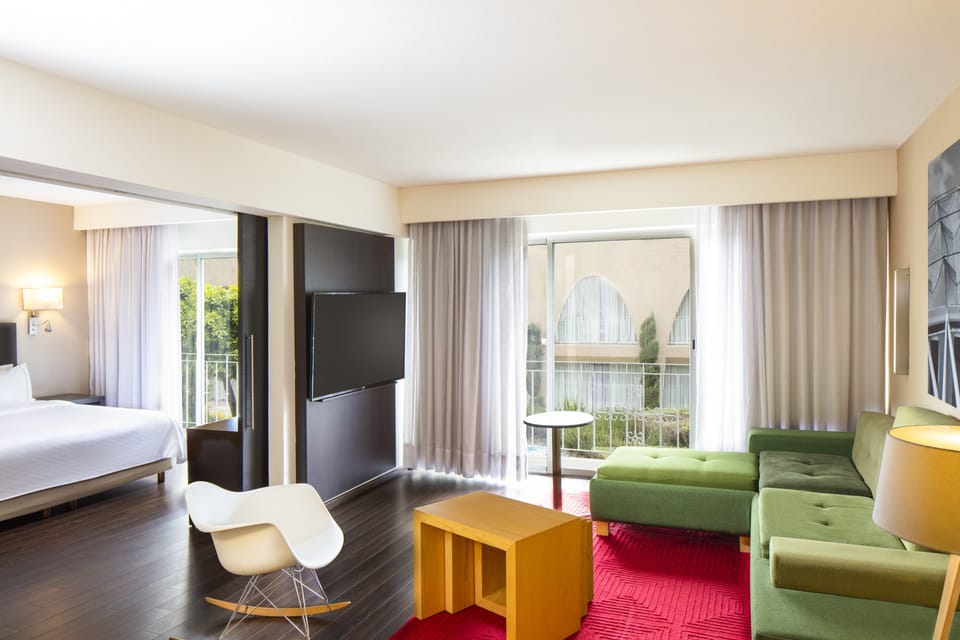 Prime Suite | Hypo-allergenic bedding available, in-room safe, desk, blackout drapes