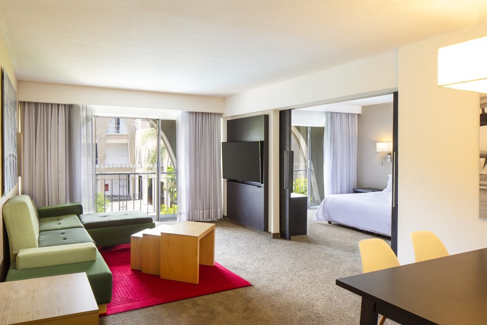 Prime Suite | Hypo-allergenic bedding available, in-room safe, desk, blackout drapes