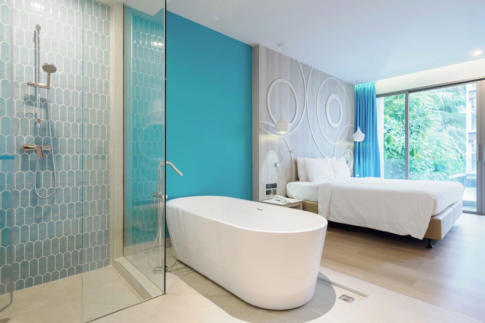 Bay Romance | Bathroom | Free toiletries, hair dryer, bathrobes, slippers