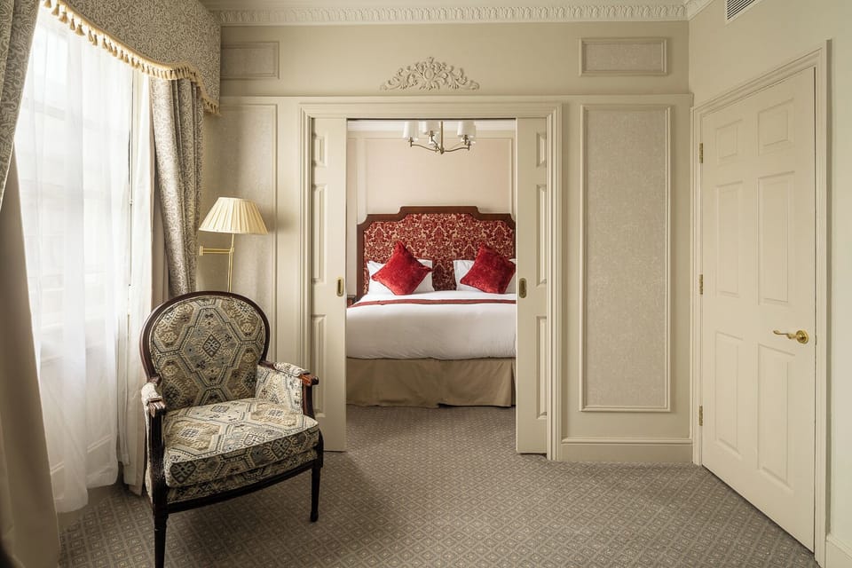 Superior 1 Bedroom Suite | In-room safe, individually decorated, desk, iron/ironing board