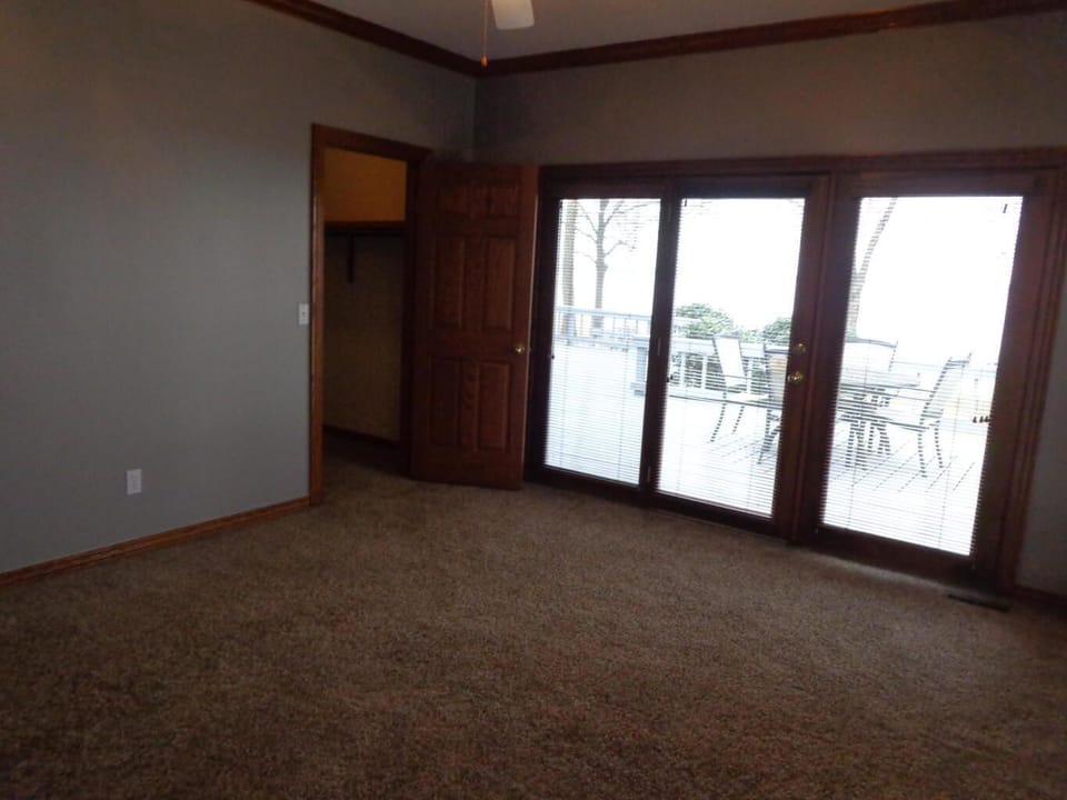 2nd bedroom with walk out to lake.