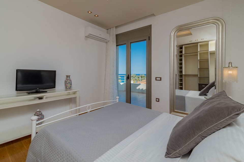 All bedrooms feature smart TVs and spacious wardrobes. 
