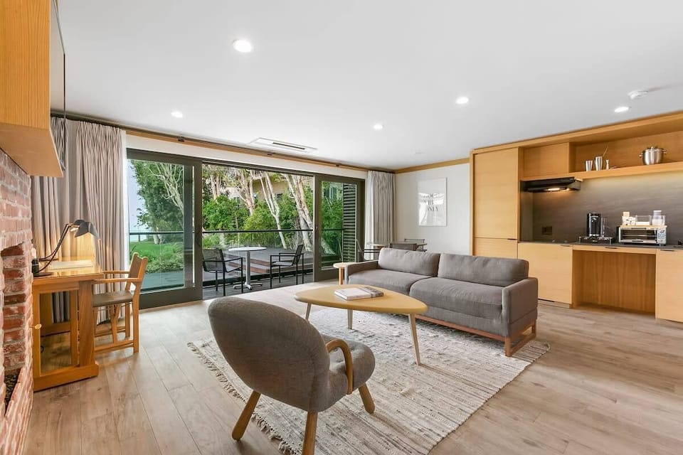 Large glass doors open to your private glass balcony to truly connect with the beautiful outdoors.