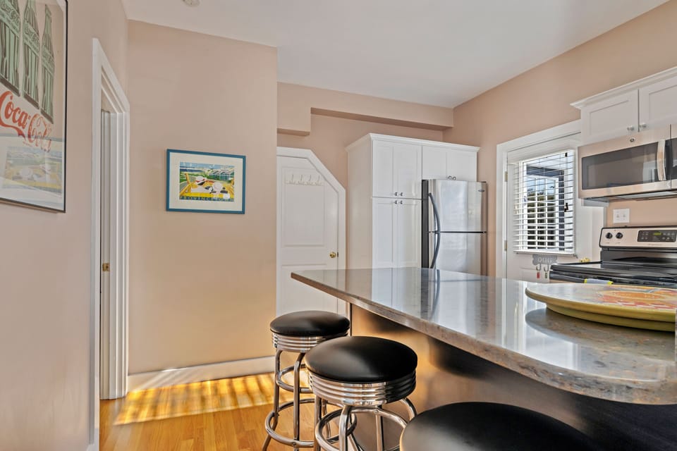 kitchen peninsula with bar stools