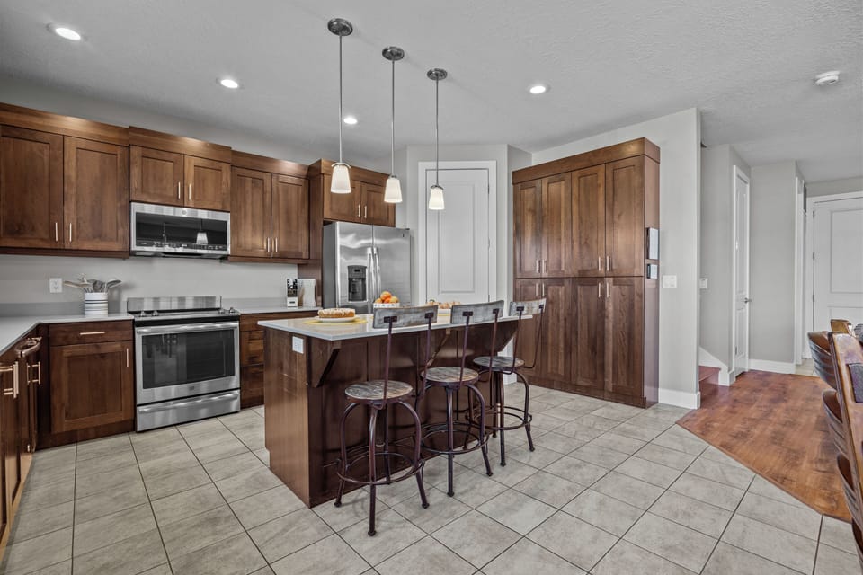 Fully Stocked Kitchen with appliances and counter area  / Island