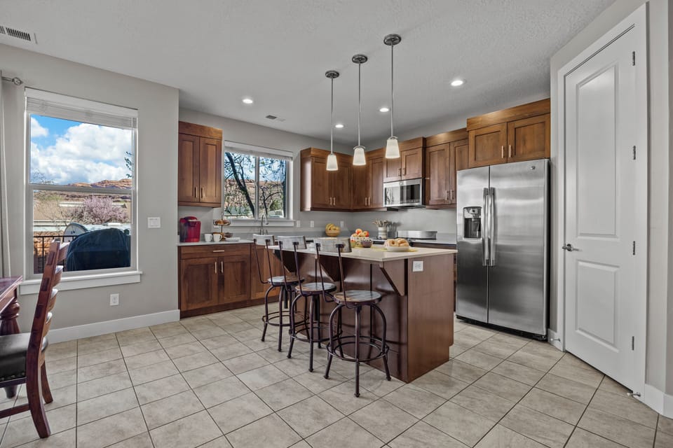 Fully Stocked Kitchen with appliances and counter area  / Island