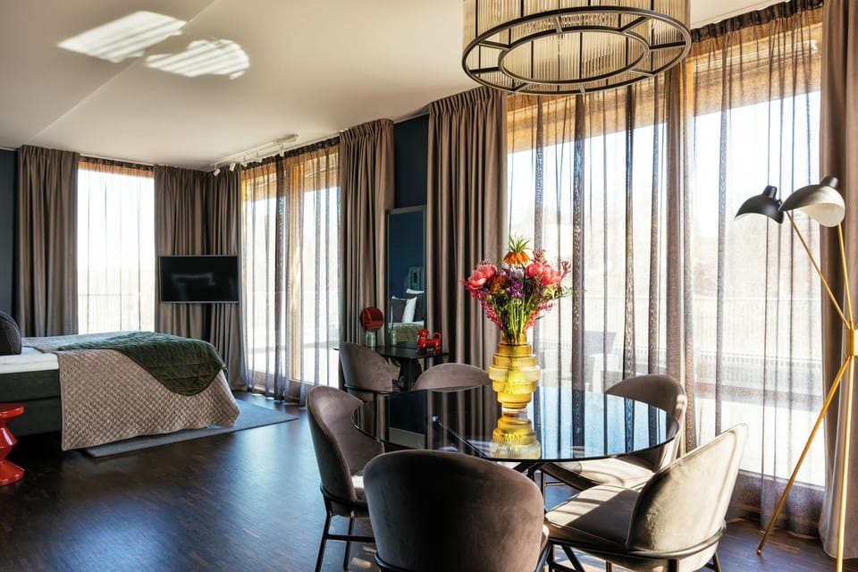 Suite (The Terrace) | Living area | 42-inch flat-screen TV with satellite channels, TV