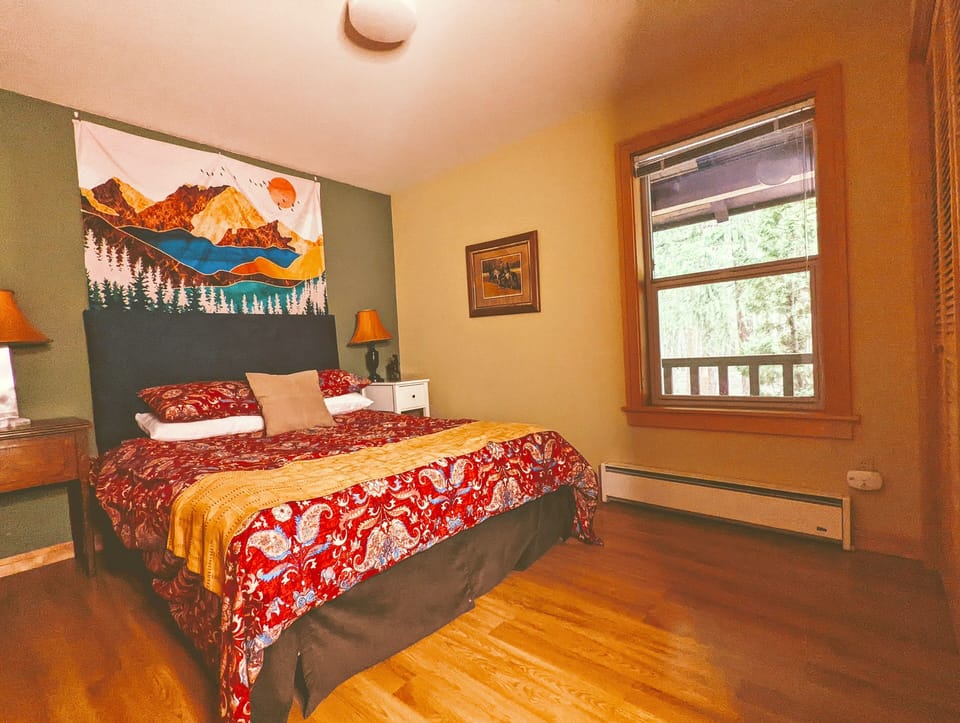 Queen bedroom on main level across from full bathroom.