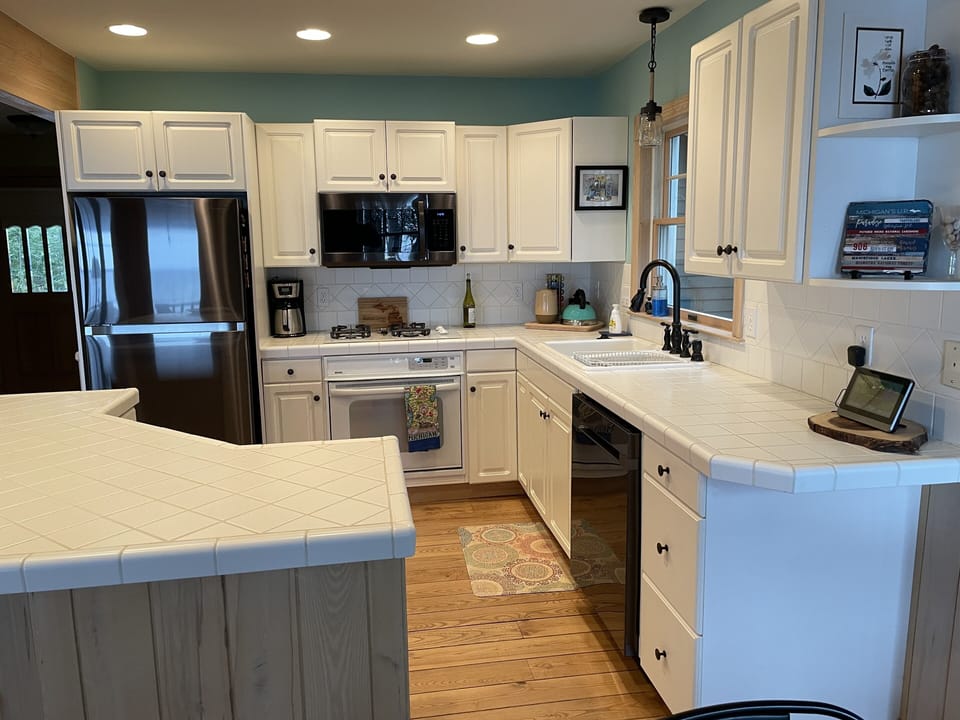 Kitchen with new black stainless appliances 