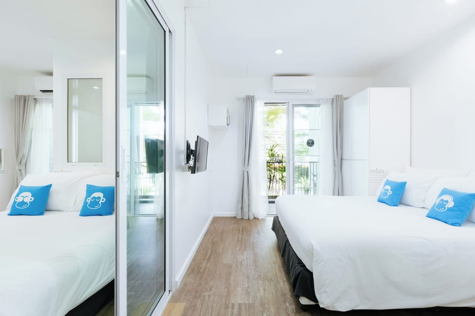 Deluxe Connecting Family | In-room safe, individually decorated, desk, blackout drapes