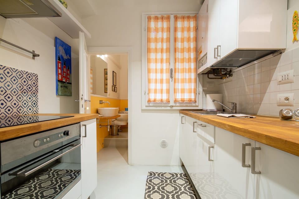 Design Apartment | Private kitchen | Full-size fridge, oven, stovetop, coffee grinder