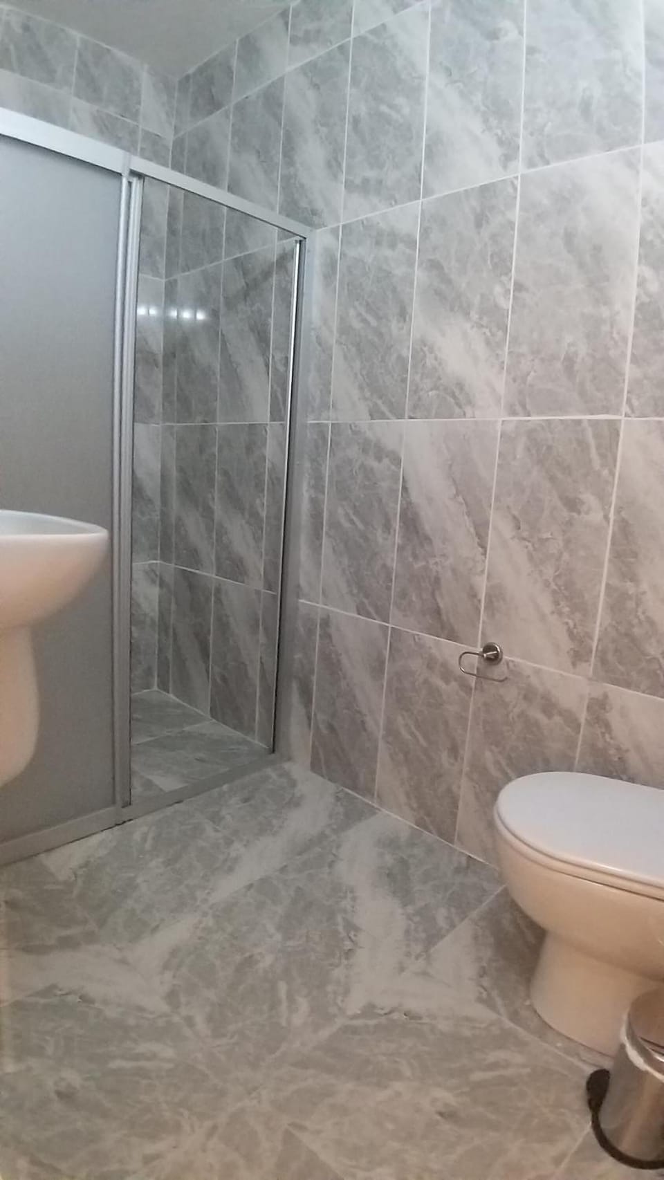 Hair dryer, slippers, towels, soap