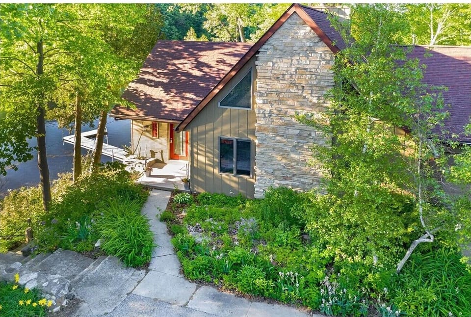 Note the brand new pier behind house.