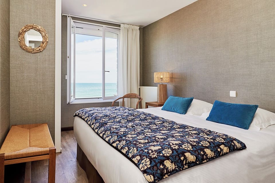 Family Suite, Two Bedrooms (one with a sea view), Shared bathroom, Situated at 80 meters | Soundproofing, free WiFi, bed sheets