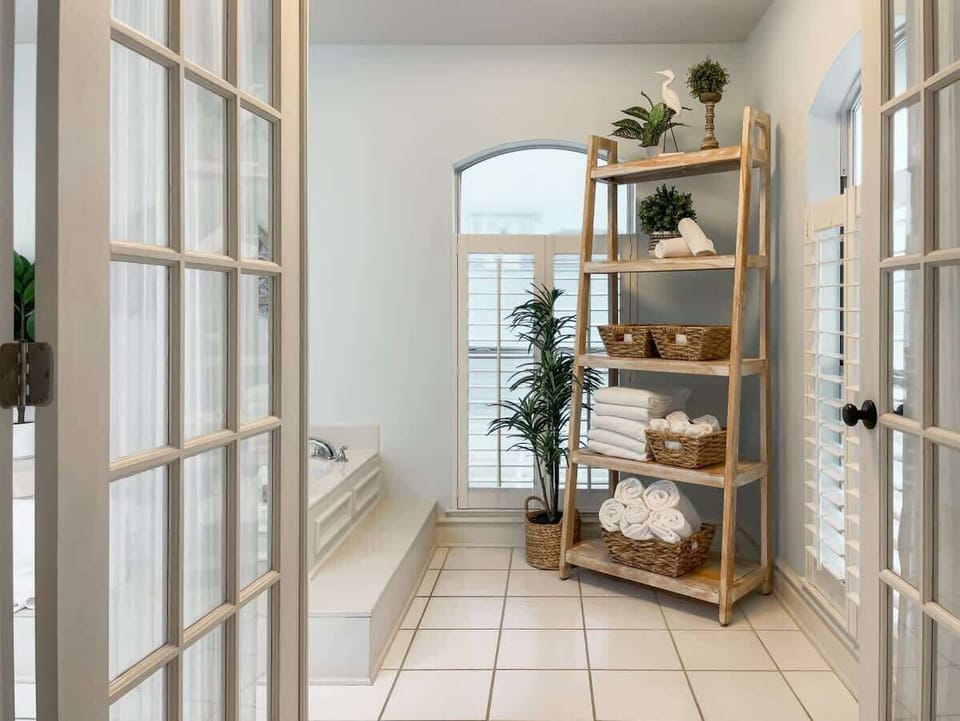 Take your beverage of choice and enter the spa-like master bath.