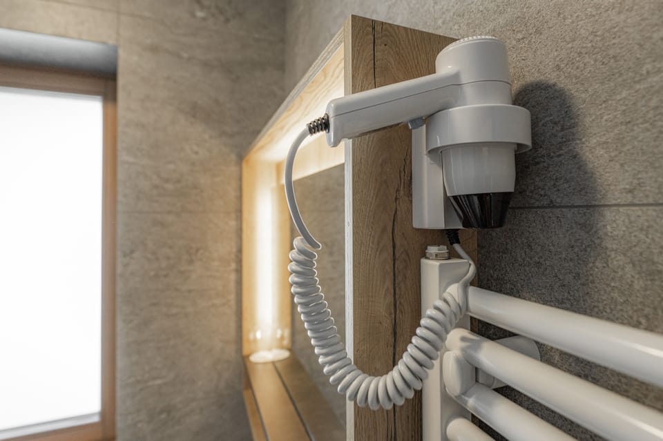 Family Quadruple Room | Bathroom | Shower, hydromassage showerhead, free toiletries, hair dryer