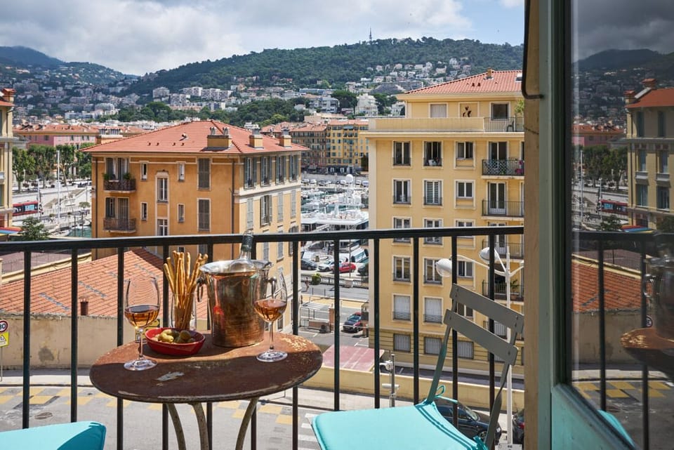 Enjoy breakfast on the balcony overlooking port and sea