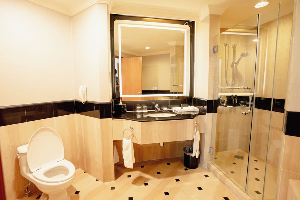 Kota Bharu Suite | Bathroom | Separate tub and shower, free toiletries, hair dryer, towels